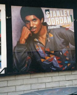 Album campaign for the Blue Note release. Hand-painted billboard for jazz guitarist Stanley Jordan's album Standards Volume 1