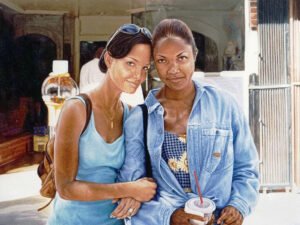 Oil painting of two women posing together on a sunlit street