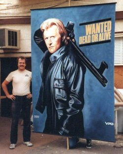 Rutger Hauer, painted for the 1986 home-video release. David Escobar beside his hand-painted Wanted Dead or Alive panel of Rutger Hauer.